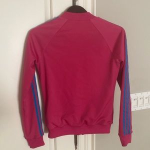 Pink and blue Adidas zip up